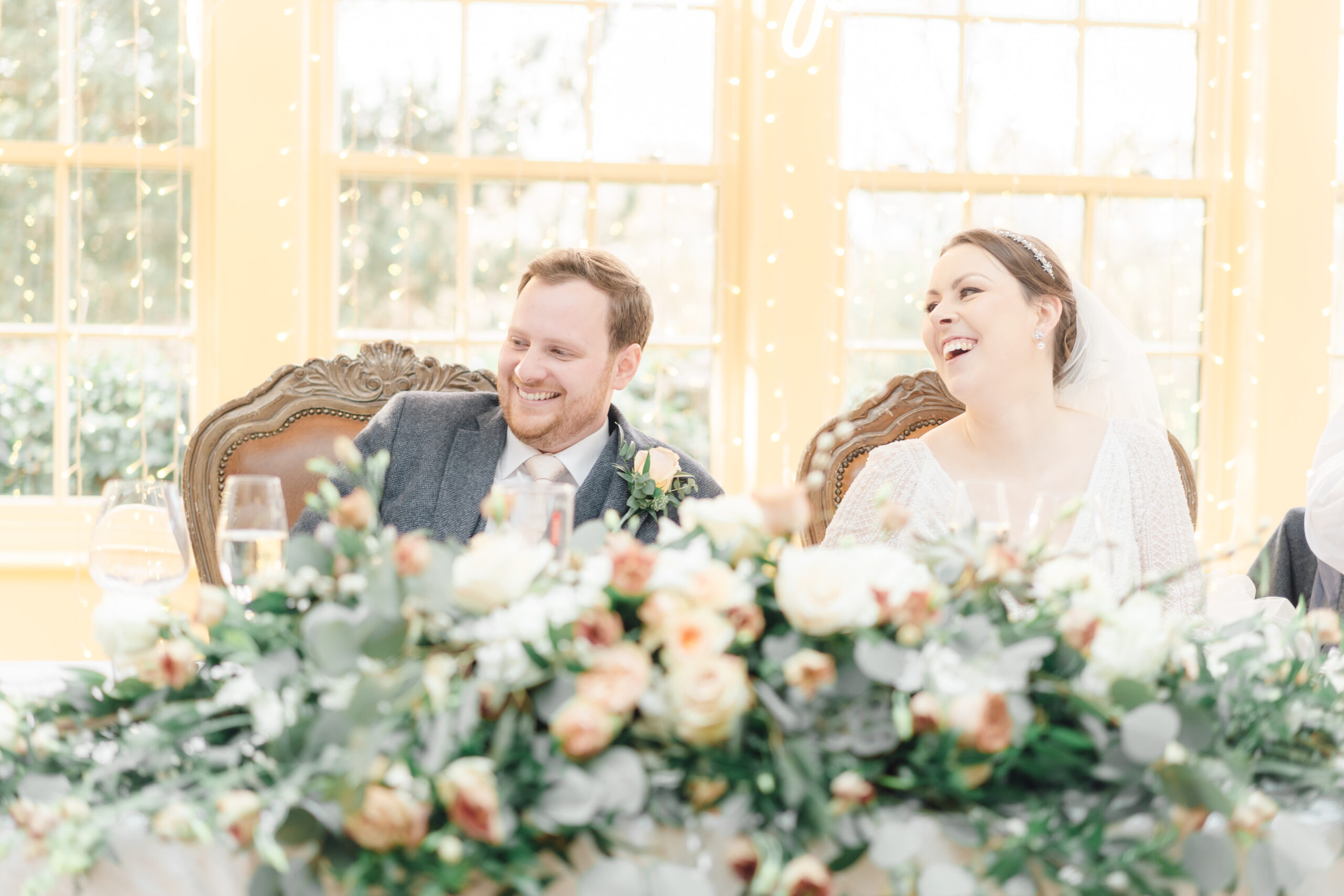 bride and groom laughing at Mitton Hall