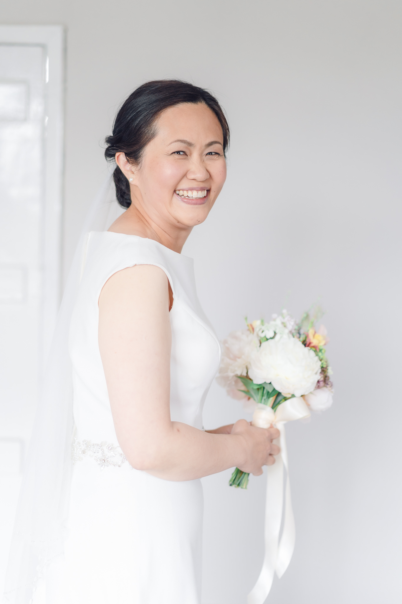 smiling bride Tips for Light & bright bridal prep Wedding photographs
