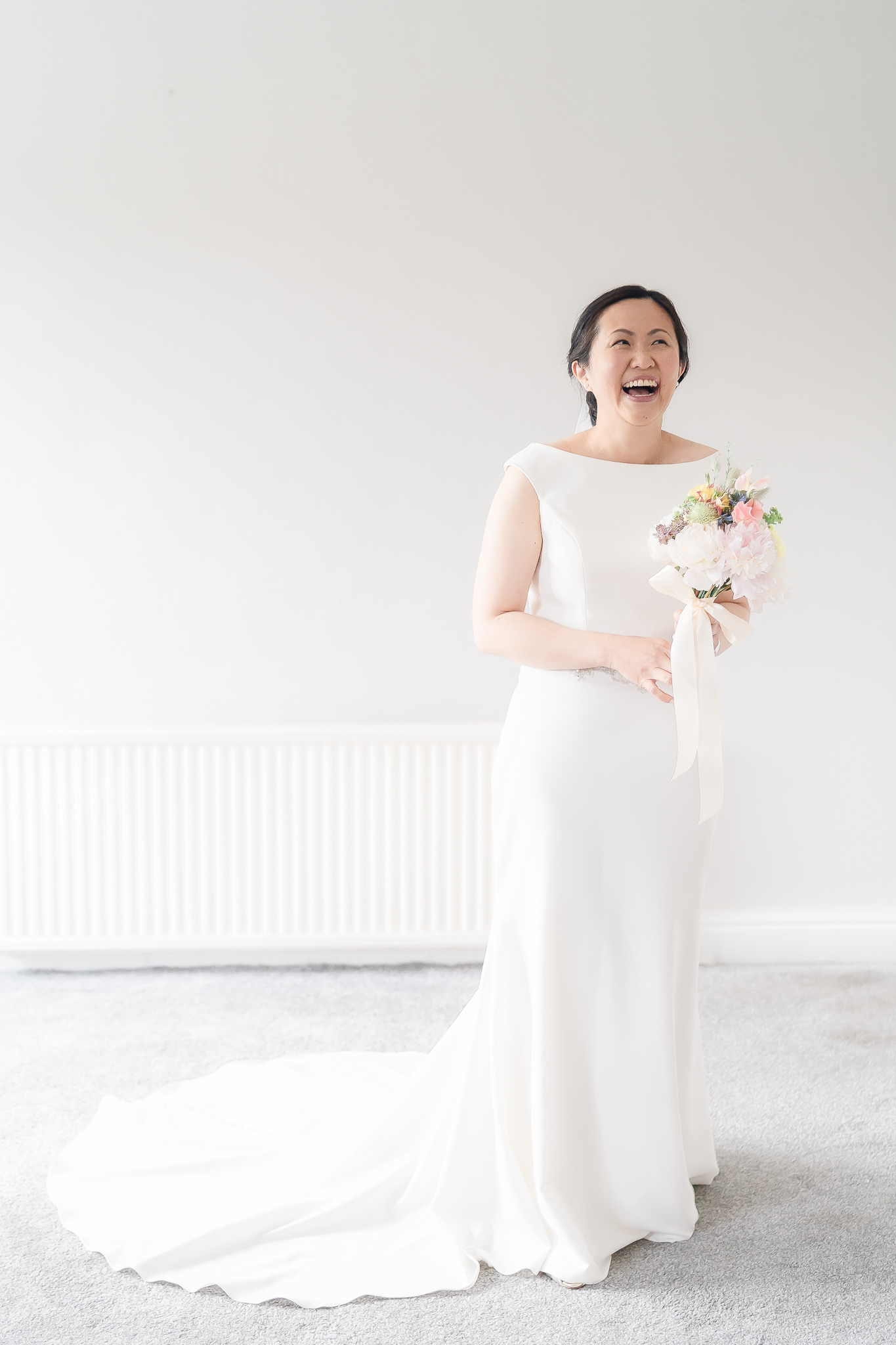 happy woman in white dress Tips for Light & bright bridal prep Wedding photographs