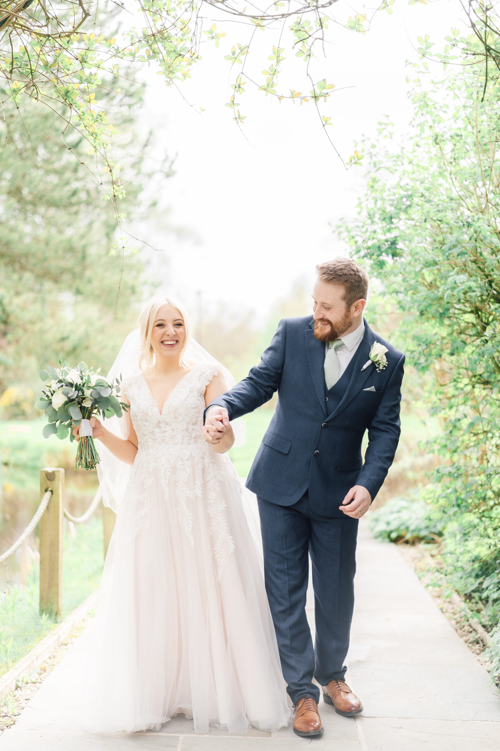 laughing bride and groom