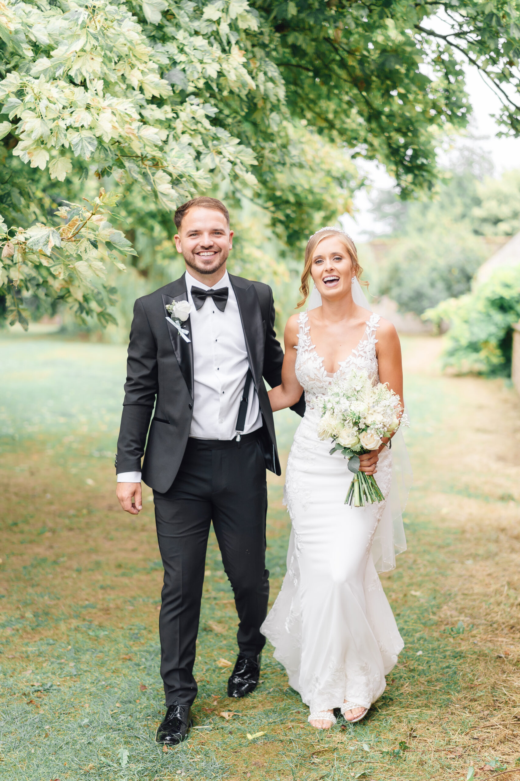 groom and bride laughing