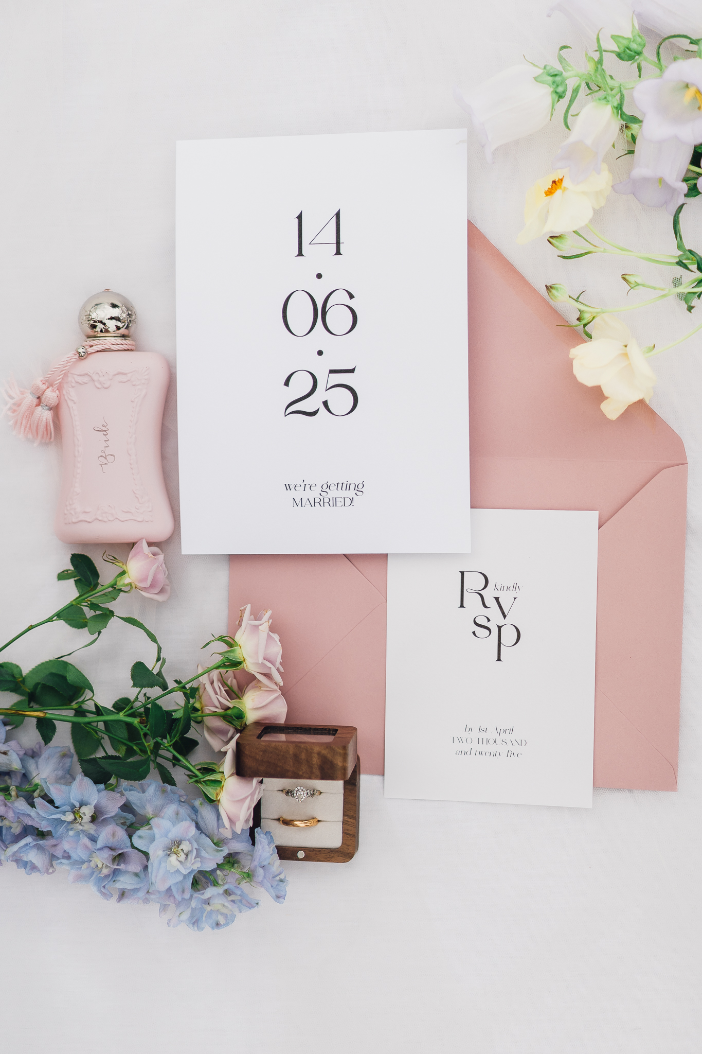 Light & airy cheshire wedding photographer takes photos of wedding invitations