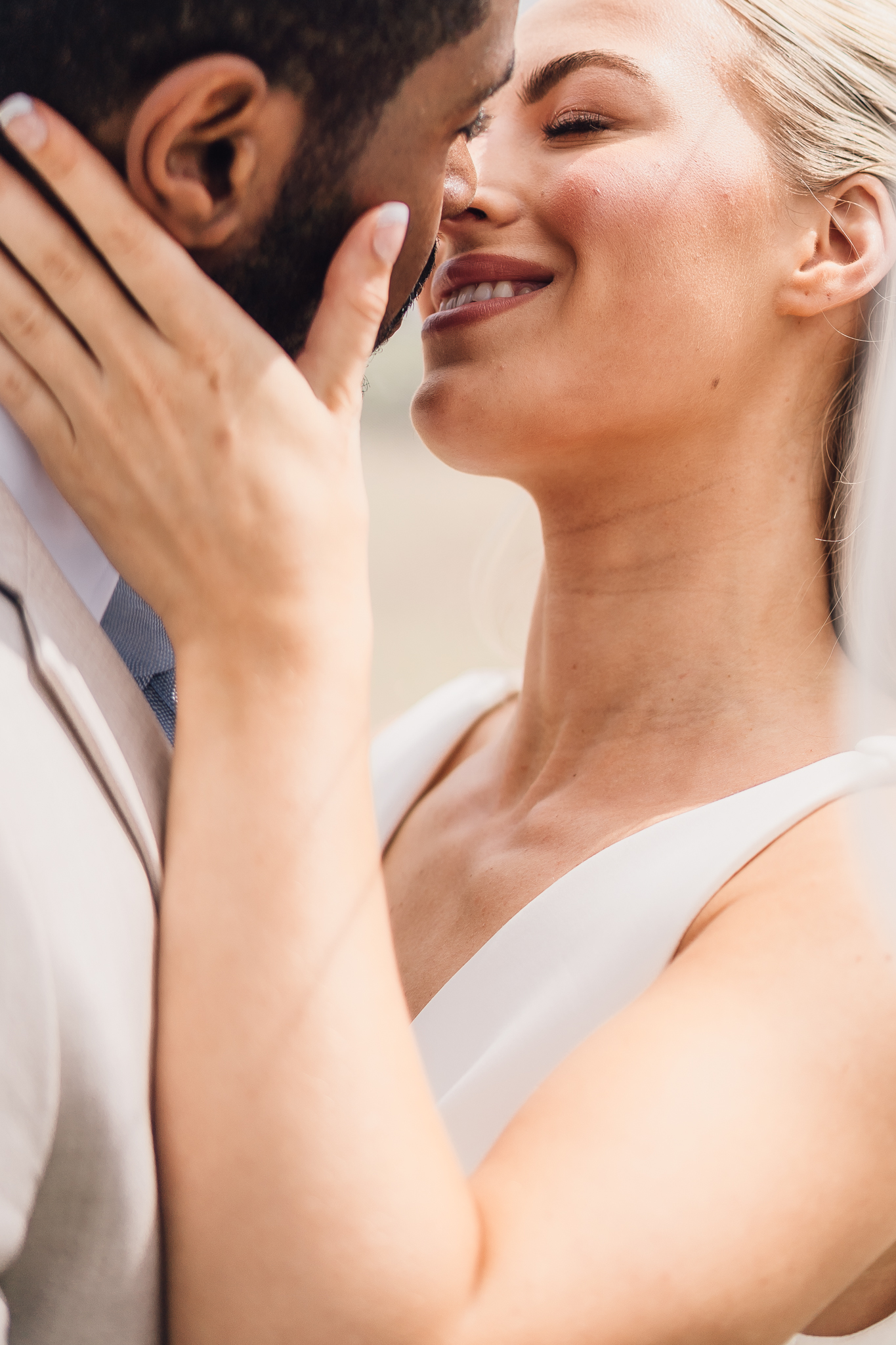 bride and groom about to kiss at swanley meadows wedding venue