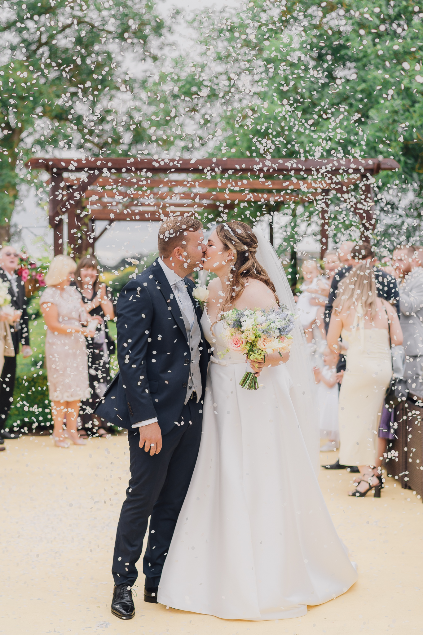 uk light and airy wedding photographer for a wedding at rutland hall hotel confetti